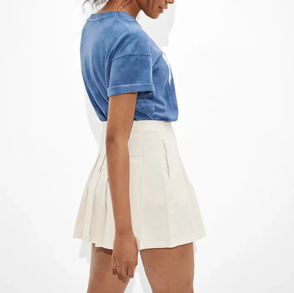 American Eagle Pleated Cream High-Waisted Mini Skirt - Picture 3 of 11